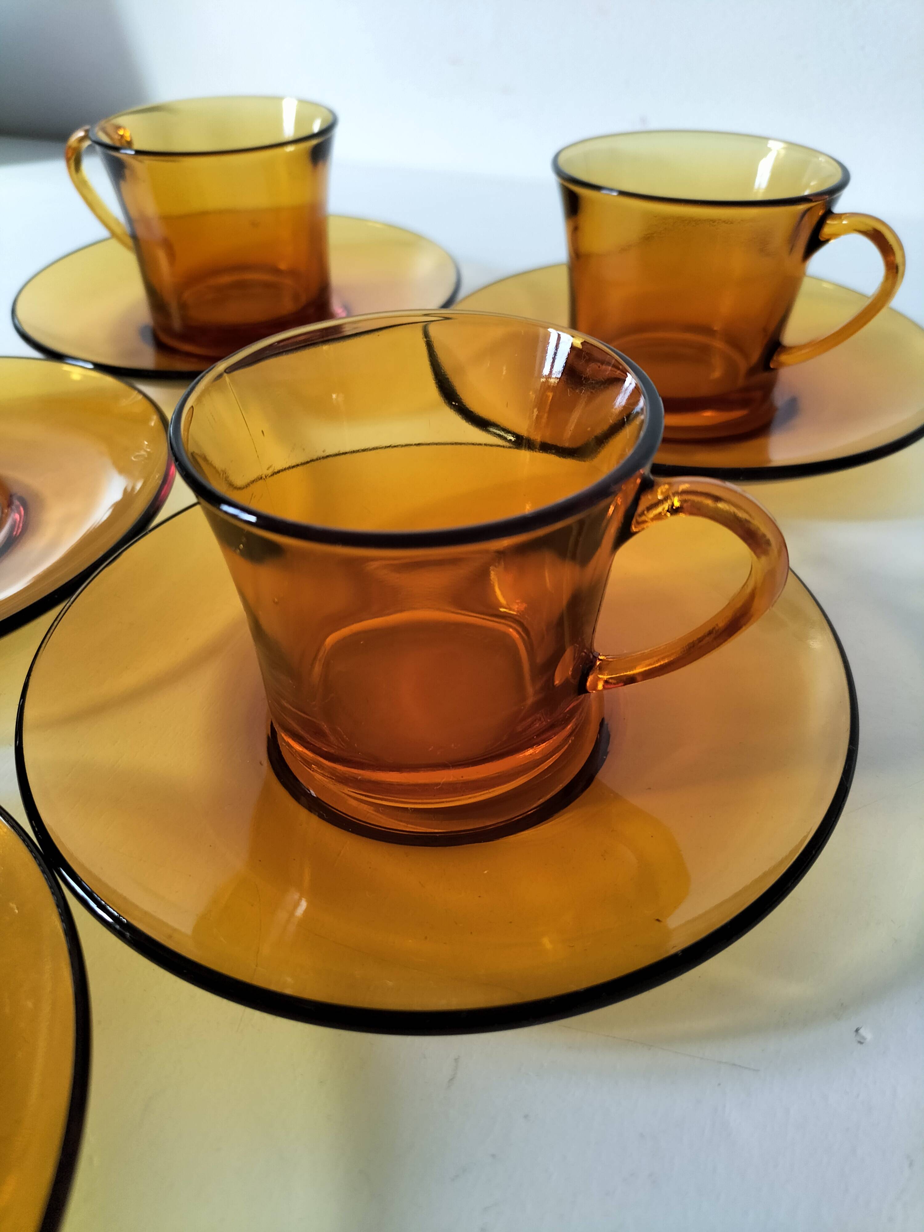 5 vintage amber Duralex cups and saucers
