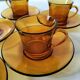 5 vintage amber Duralex cups and saucers