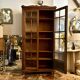 Dark wood dresser with 2 doors and 6 shelves
