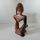 Wooden statuette sculpture of a thinking man design