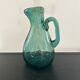 Bluish blown glass carafe