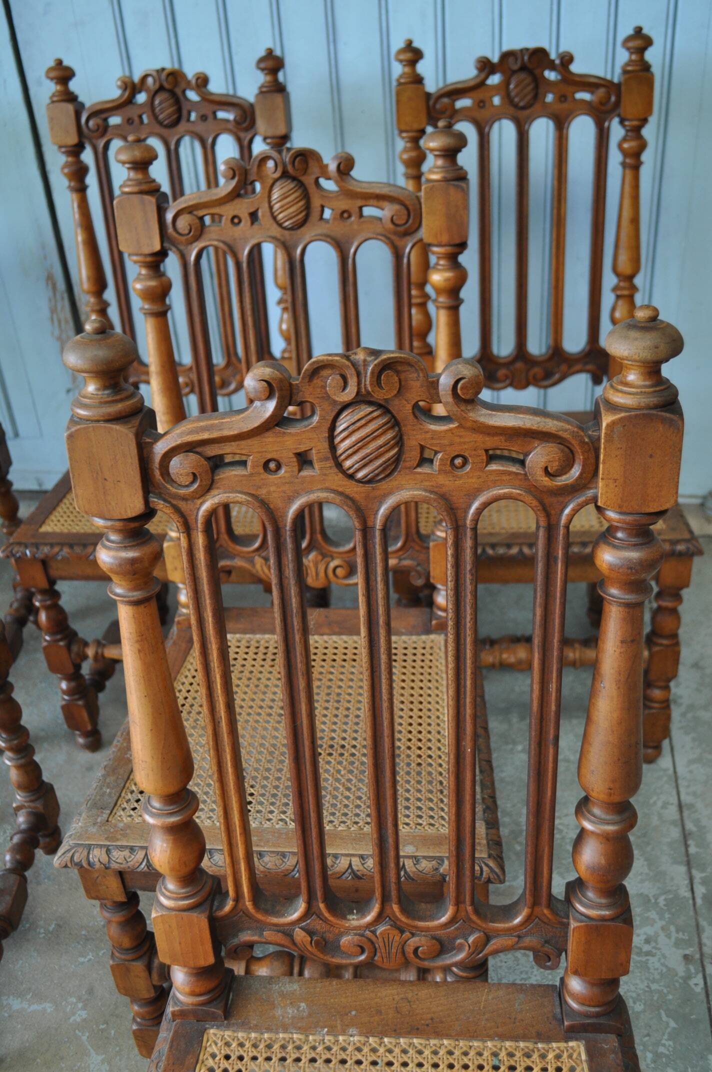 Set of 8 tanned chairs.