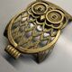 Old brass owl table mat