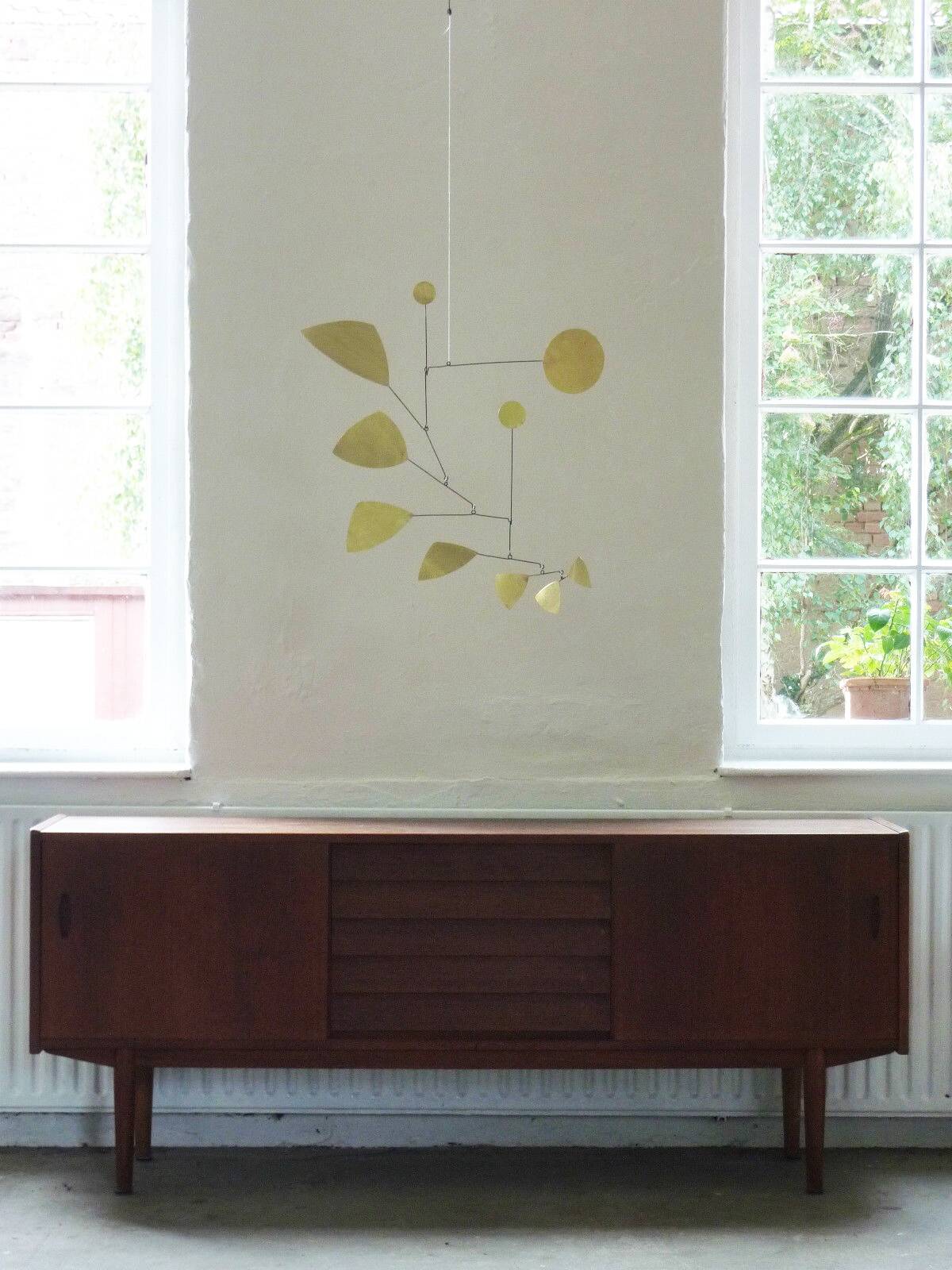 Mobile sculpture in brass and iron