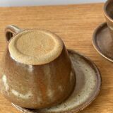 Vintage stoneware cups and saucers