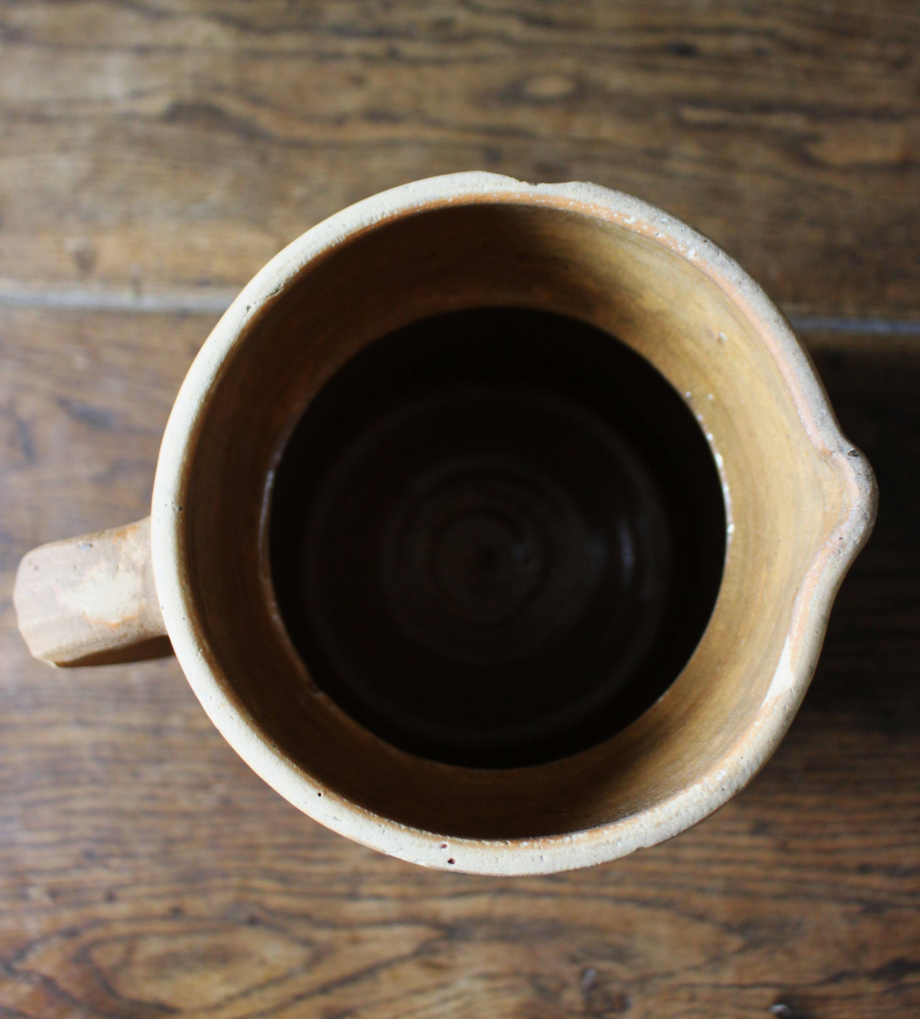 Vintage artisanal terracotta jug
