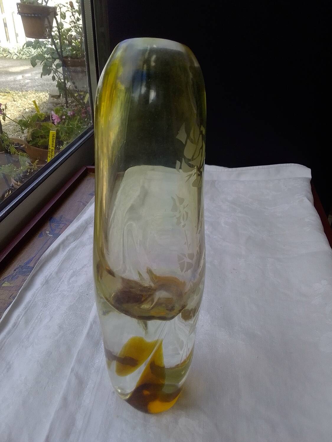 Amber-colored engraved crystal vase