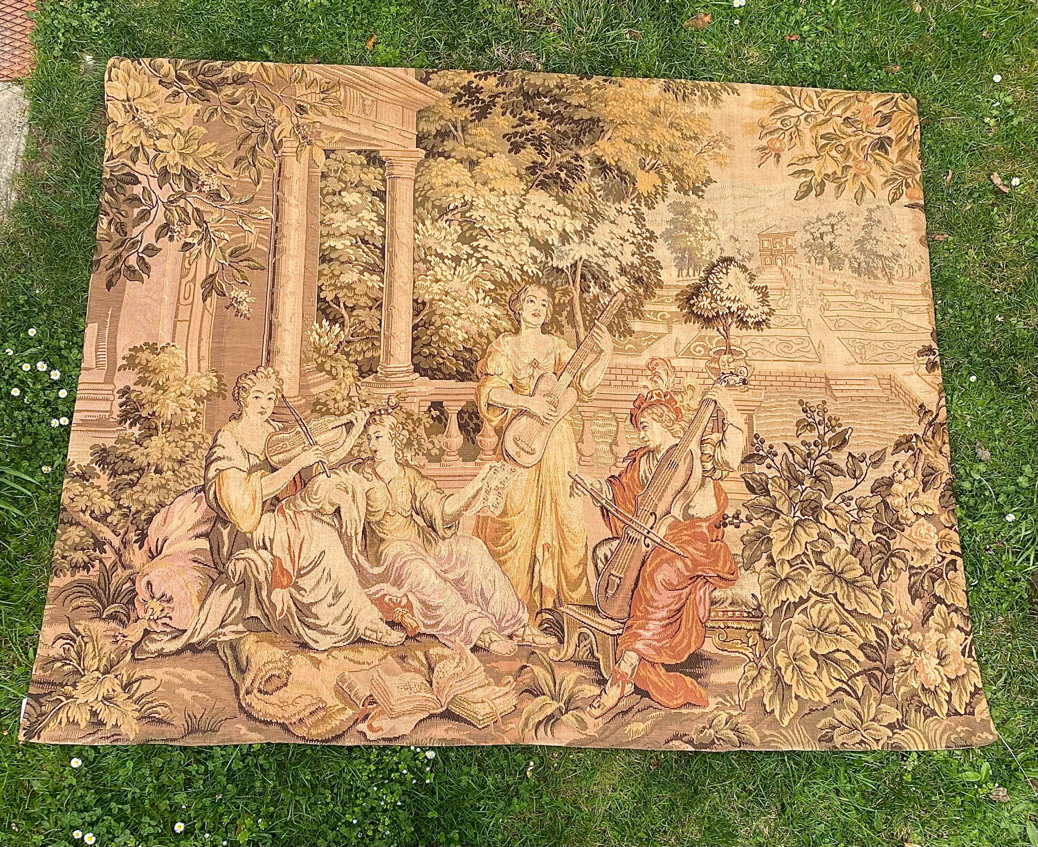 Large Aubusson-style wall tapestry with a musical scene.