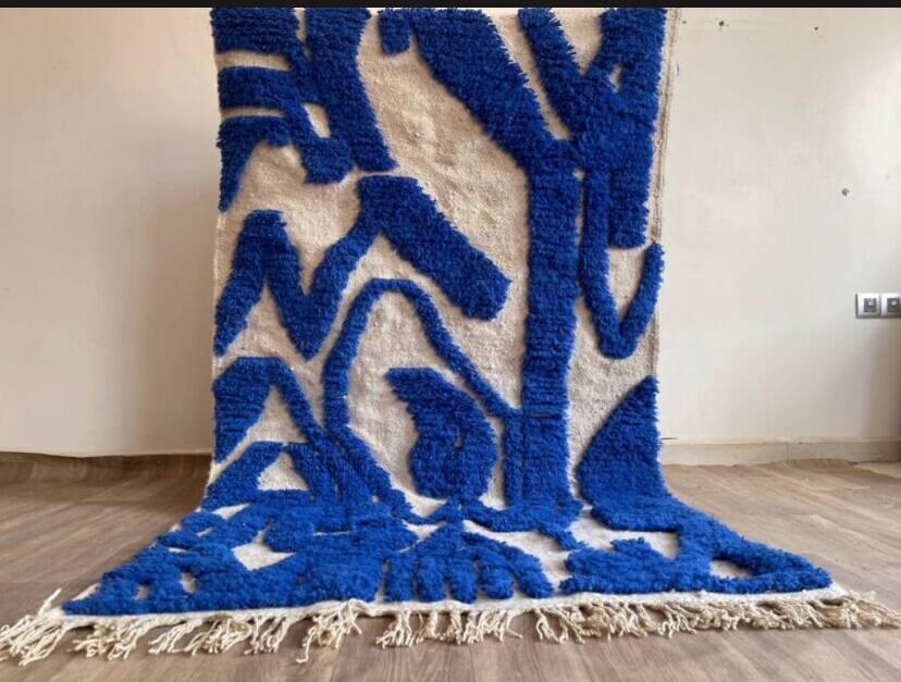 Wool rug with geometric patterns 200/300