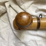 Antique wall-mounted coat rack in turned bamboo-style wood