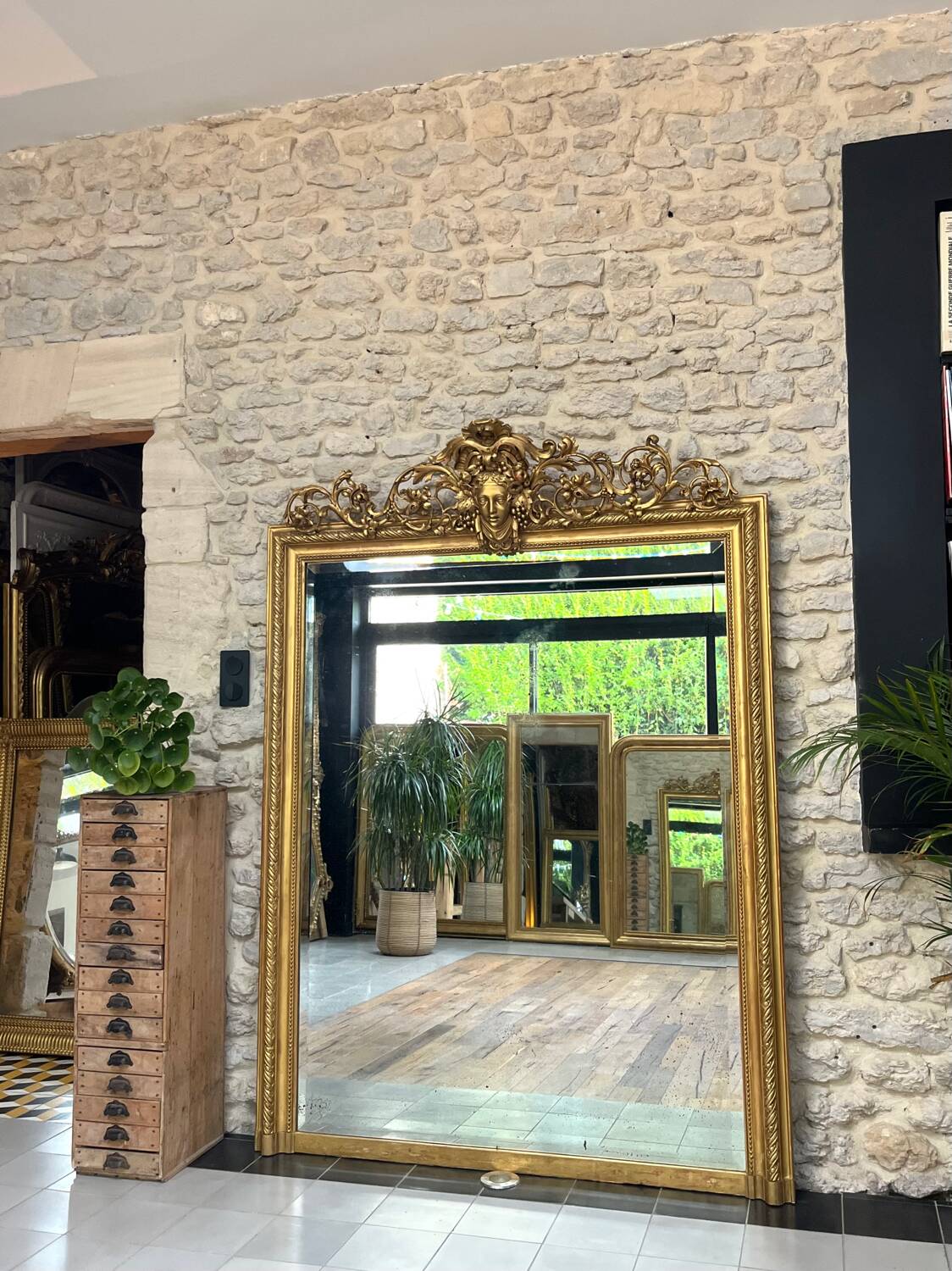 Pedimented mirror 184.5cm/135cm gilded with gold leaf