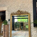Pedimented mirror 184.5cm/135cm gilded with gold leaf