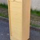 Beige wooden cabinet with curtains or sliding shutters 120cm