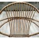 Pair of rattan shell chairs with metallic feet