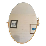Oval mirror patinated brass frame art deco