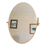 Oval mirror patinated brass frame art deco
