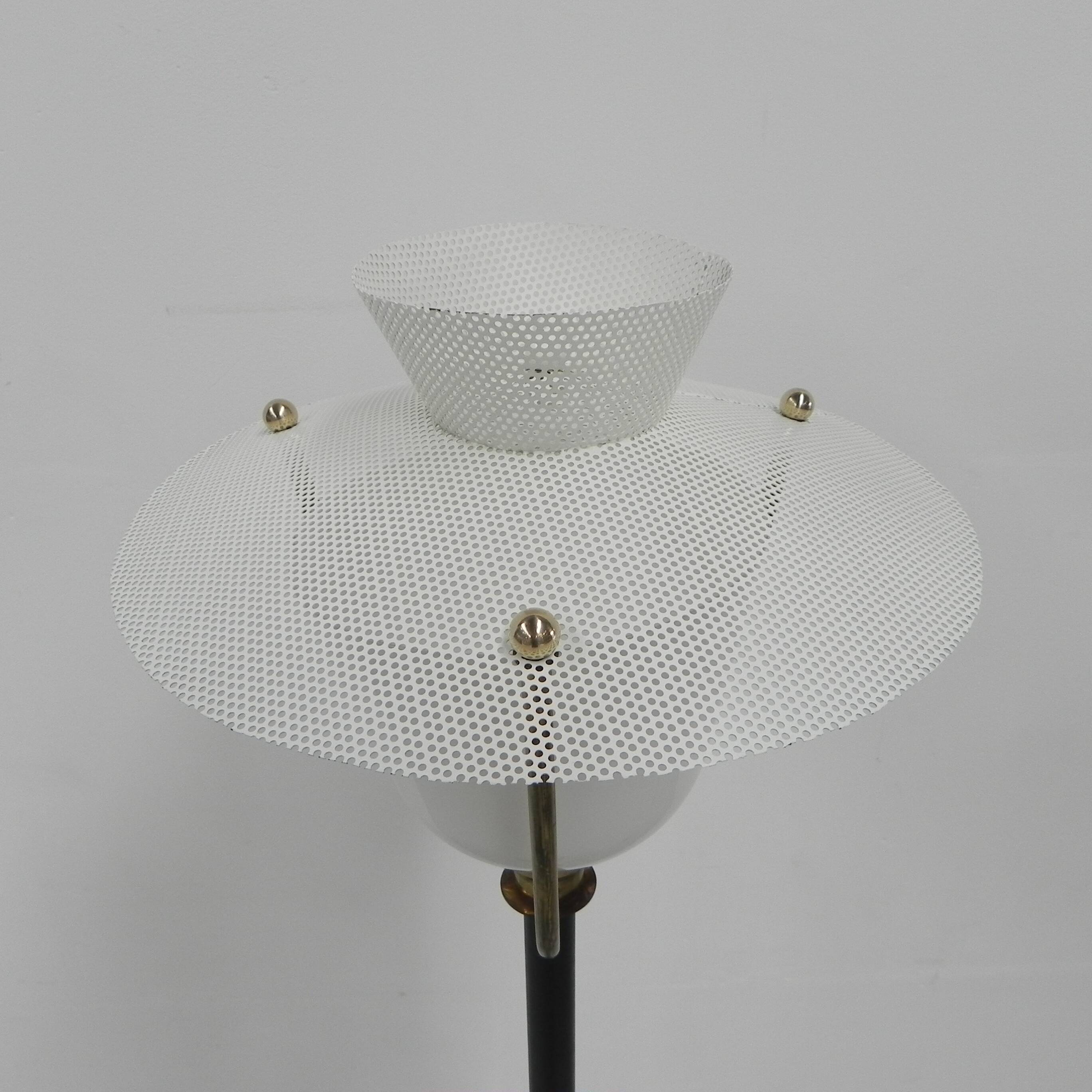 Standing vintage lamp with glass shade and perforated steel shade