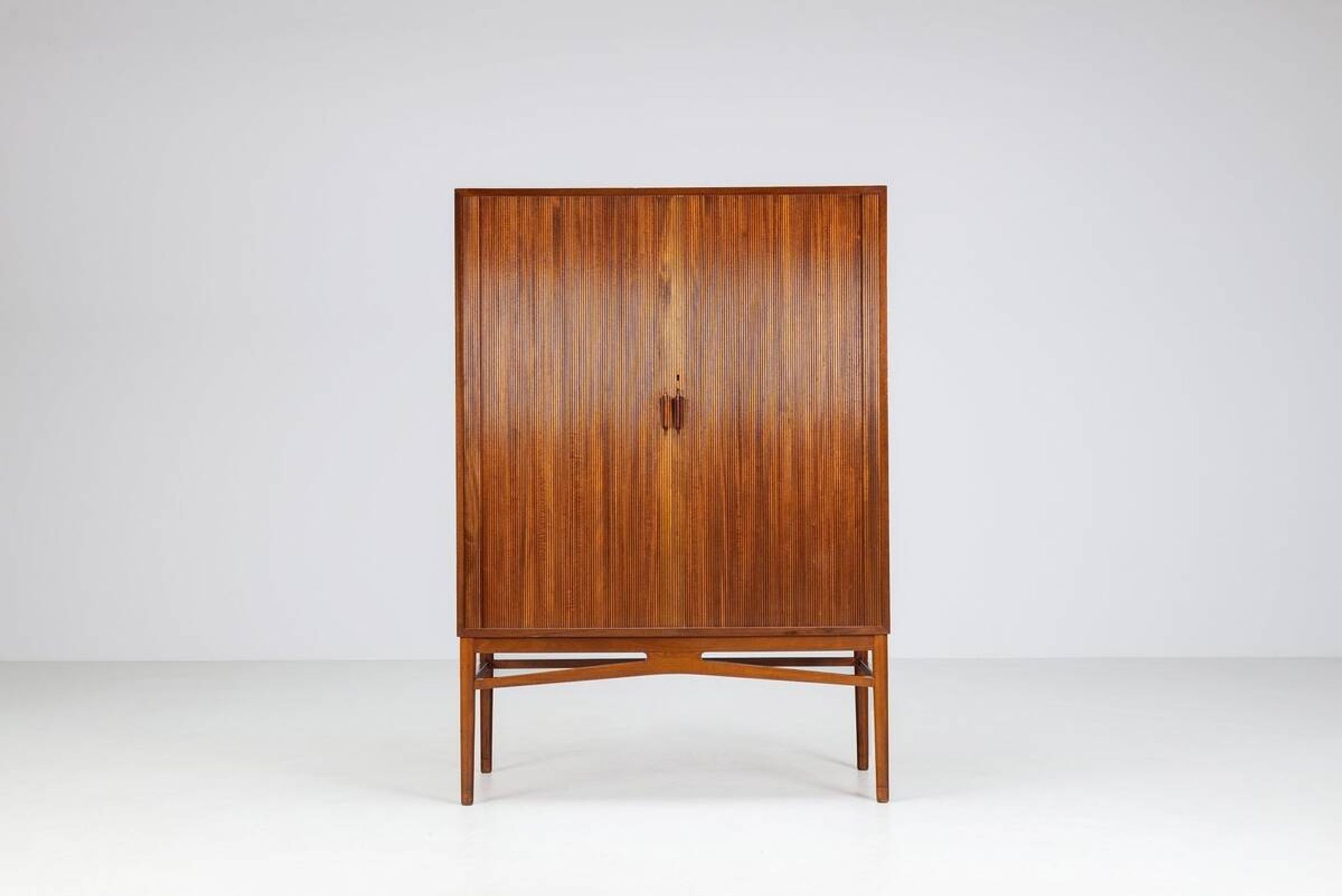 Danish high cabinet in teak with tambour doors Denmark 1960
