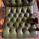 Fauteuil chesterfield en cuir vintage