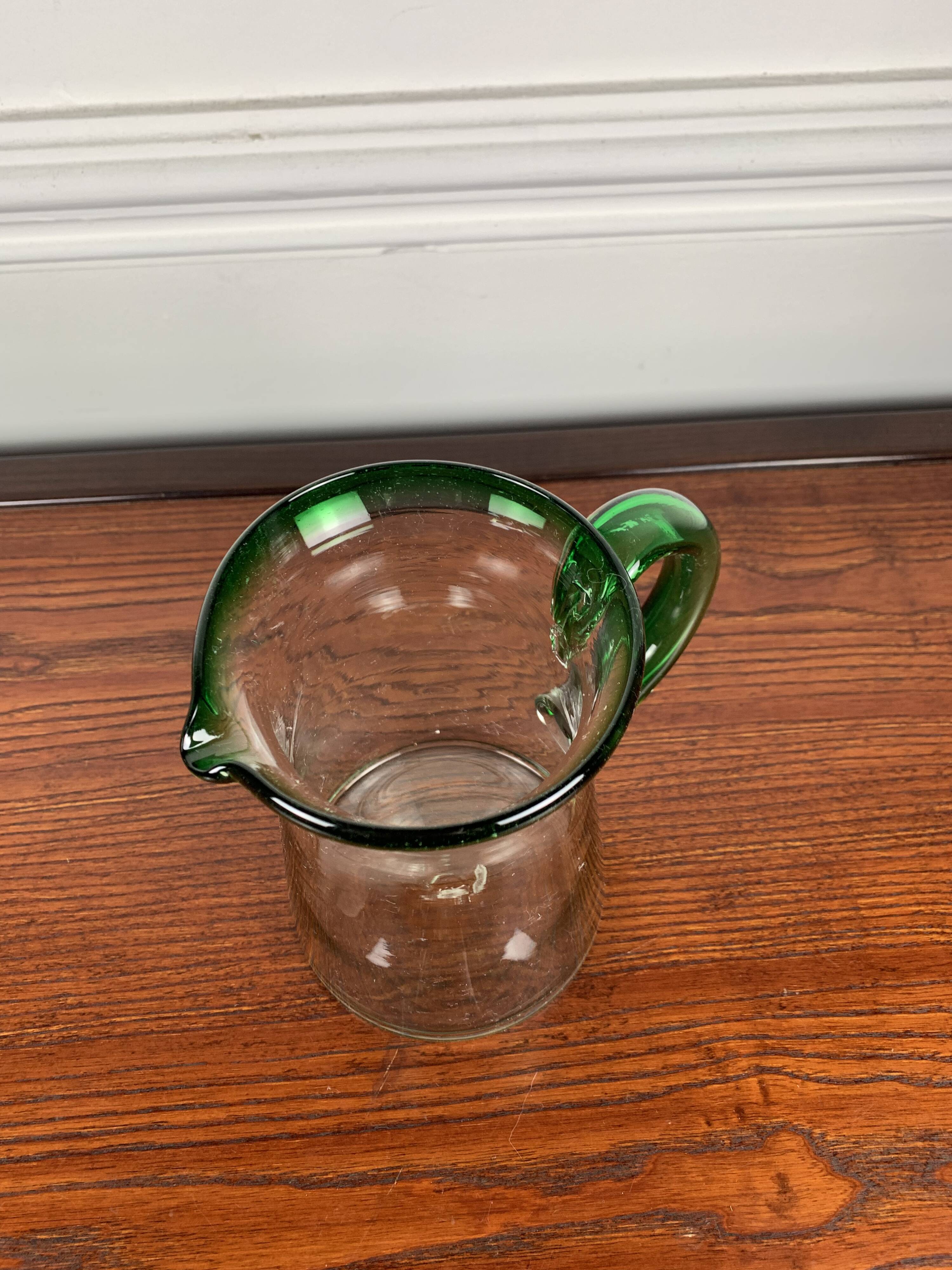 Vintage blown glass jug, green border