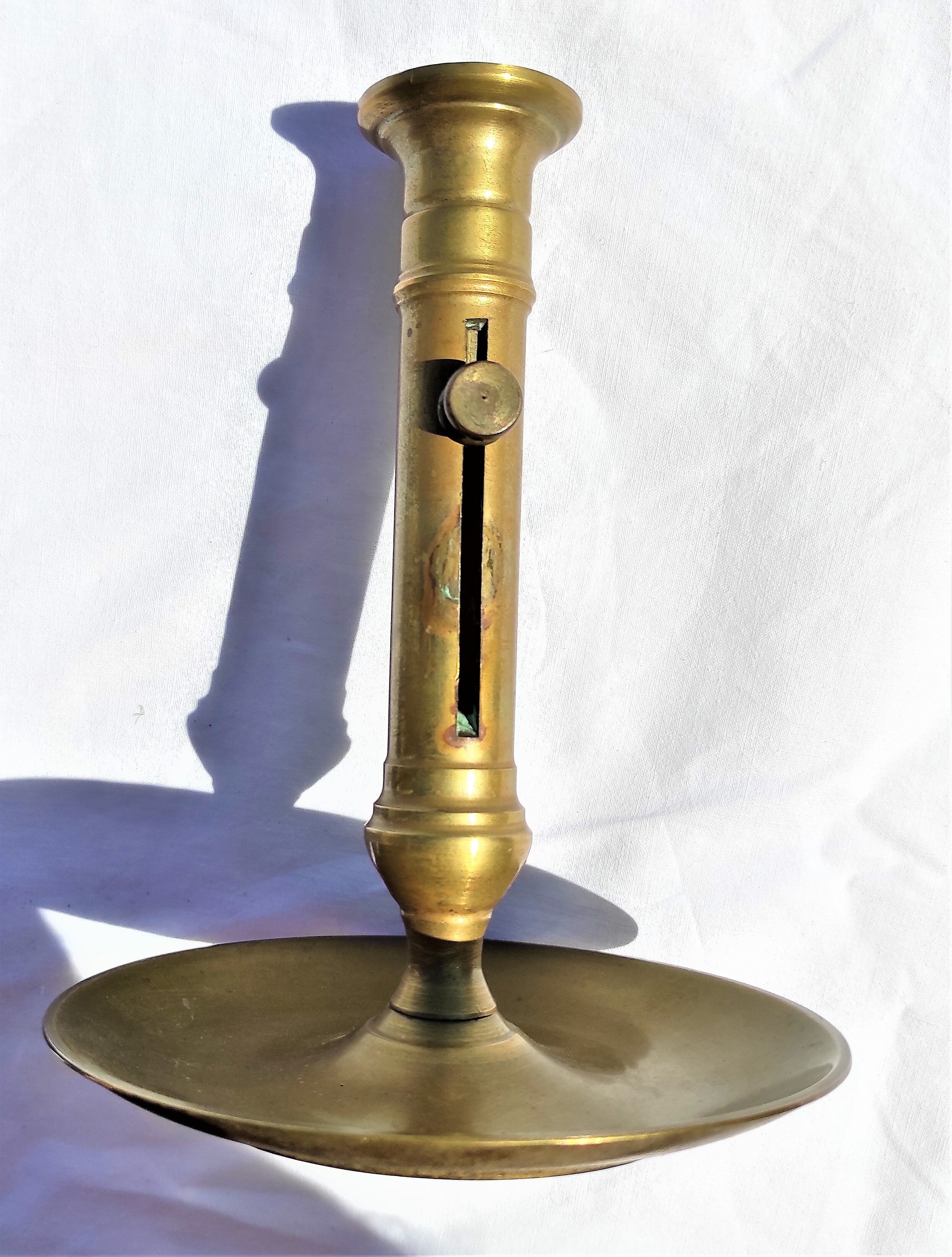 Antique brass candle holder
