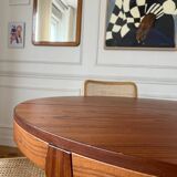Round extendable rosewood table from the 70s