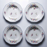 4 flat plates by Bernardaud, Limoges porcelain, floral decoration from the 1920s to 1950s.