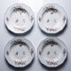 4 flat plates by Bernardaud, Limoges porcelain, floral decoration from the 1920s to 1950s.