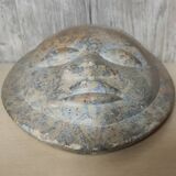 African stone face sculpture