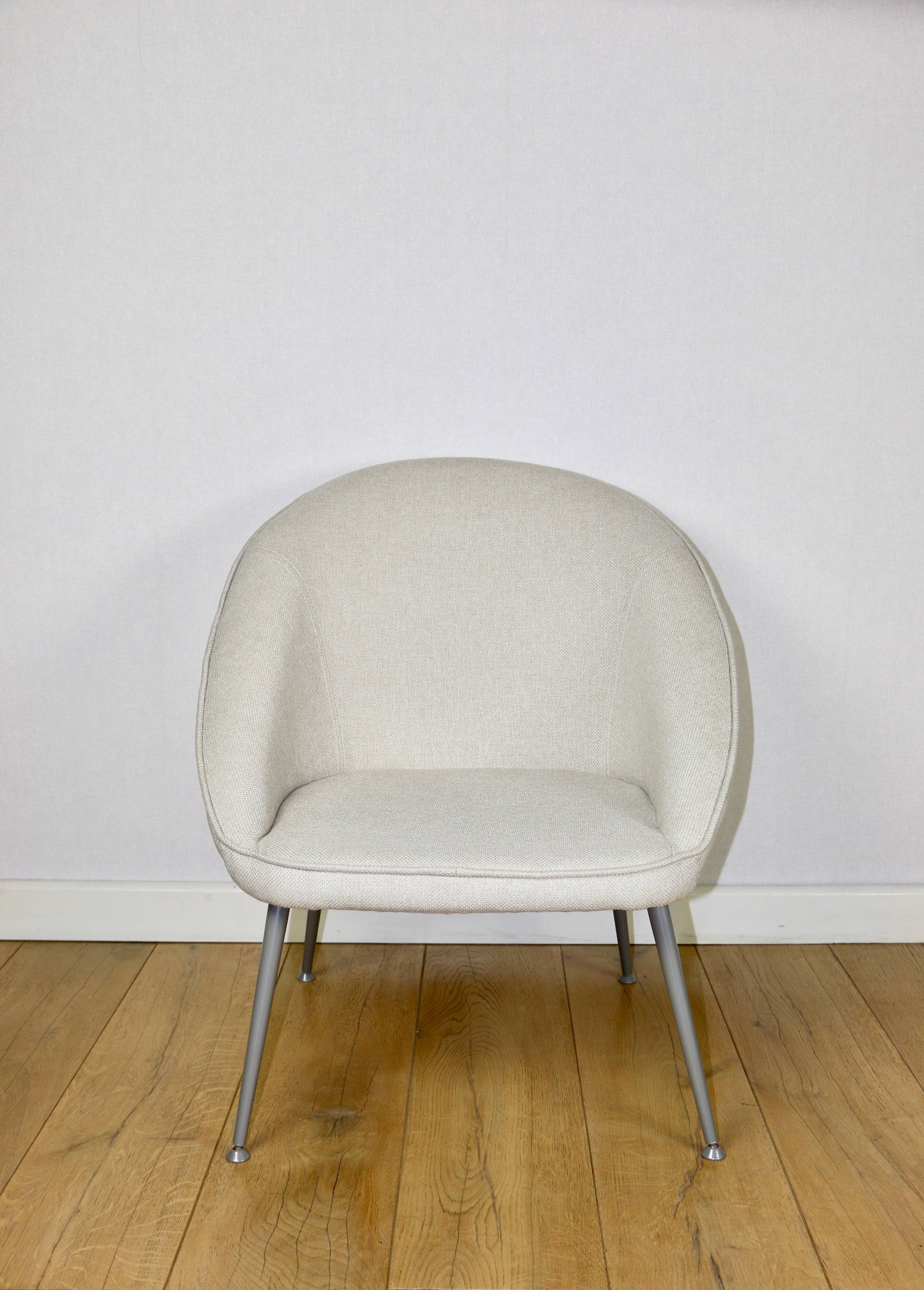 Beige ivory shell armchair from the 70s on grey metal legs - beautiful