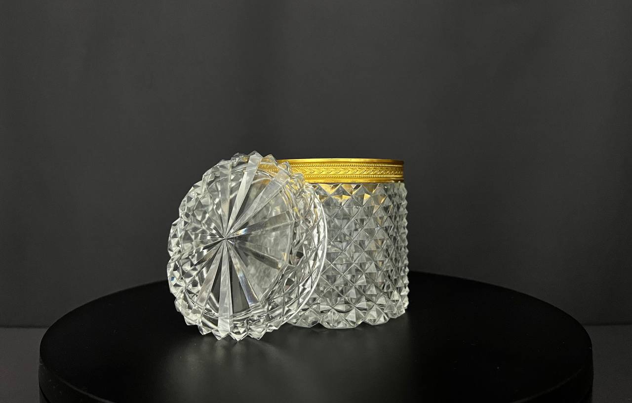 Cut crystal box with gilded bronze mount.