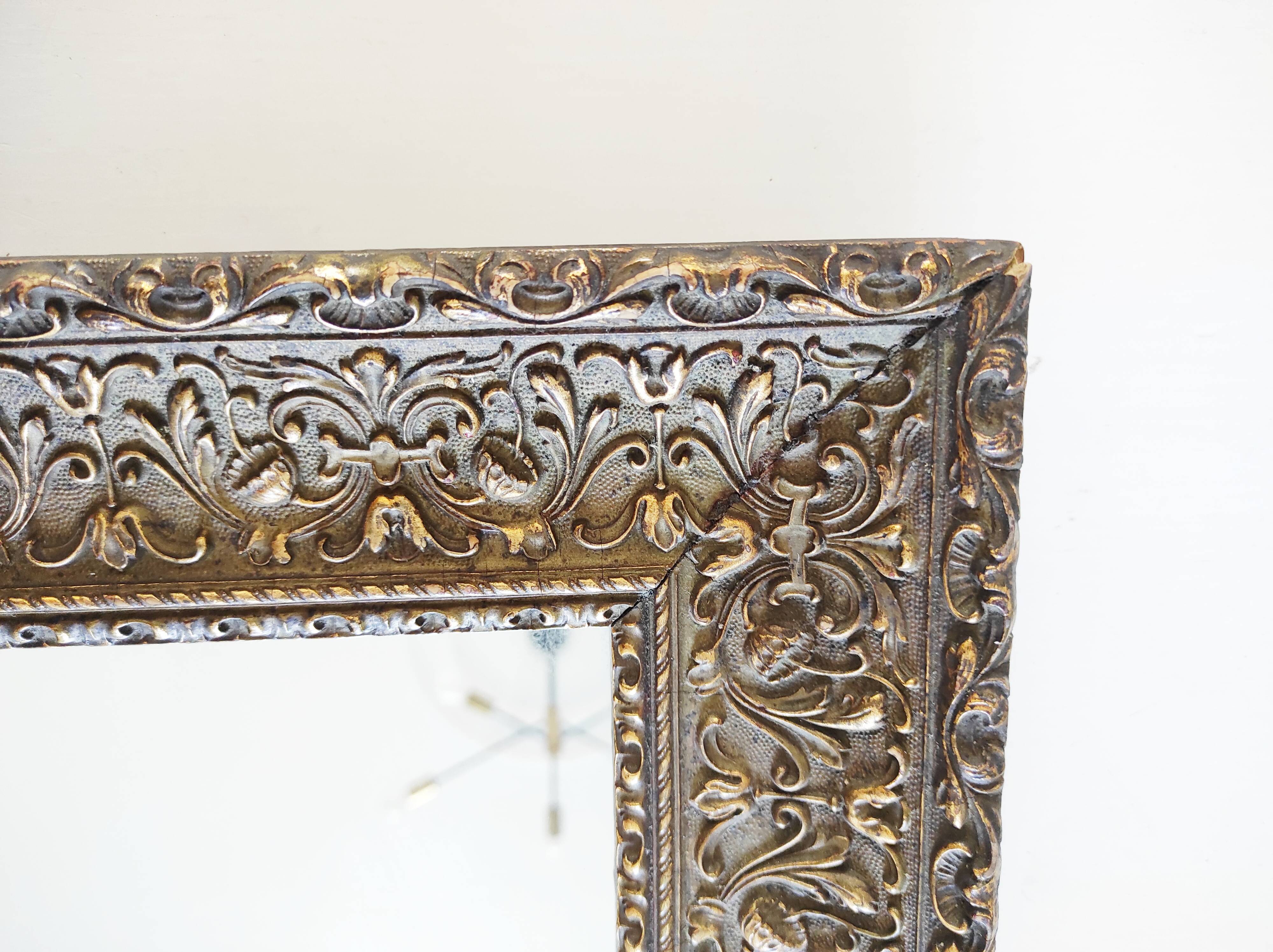 Wooden mirror, edge with embossed flowers 48 x 41 cm