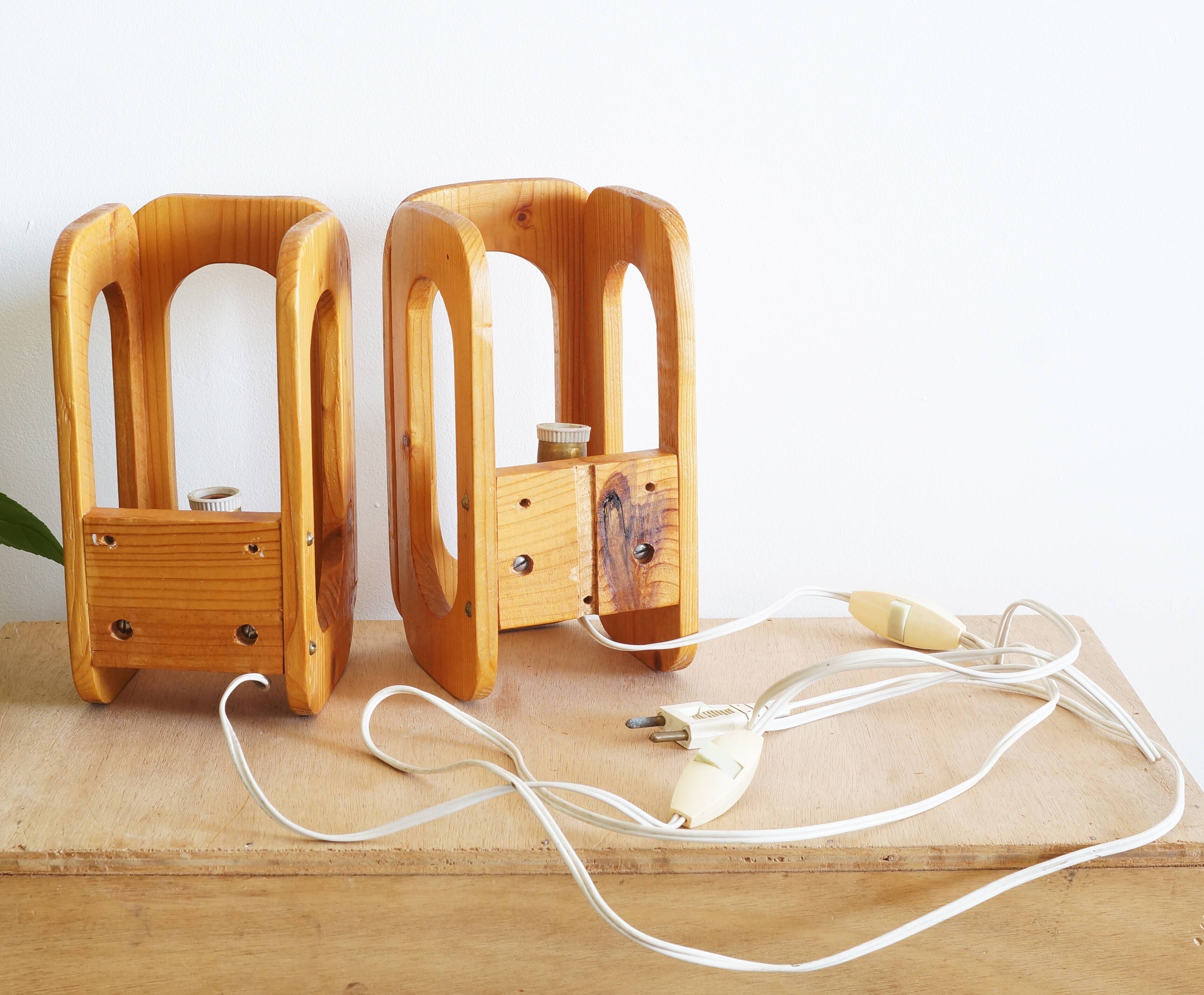 Two Scandinavian pine wall lamps in the 70s
