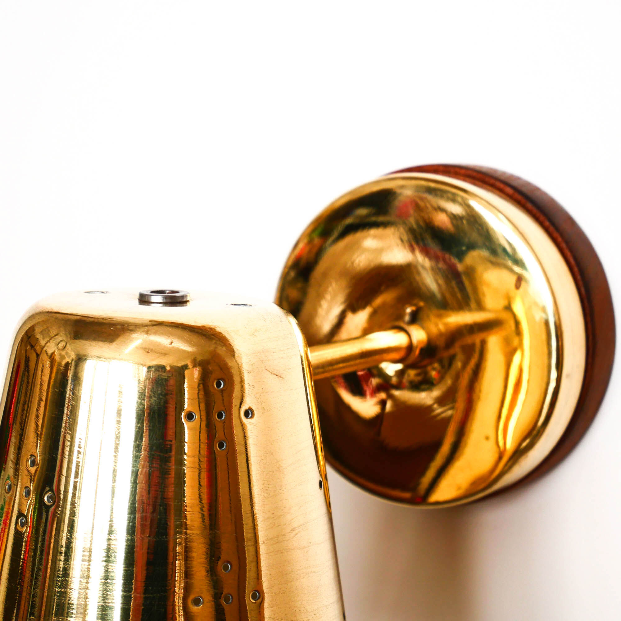 Old conical brass wall lamp, perforated lampshade