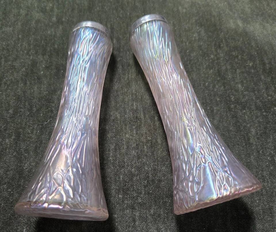 Pair of iridescent glass vases with relief decoration reminiscent of plant motifs.