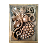 Wooden bas-relief, carved bunch of grapes