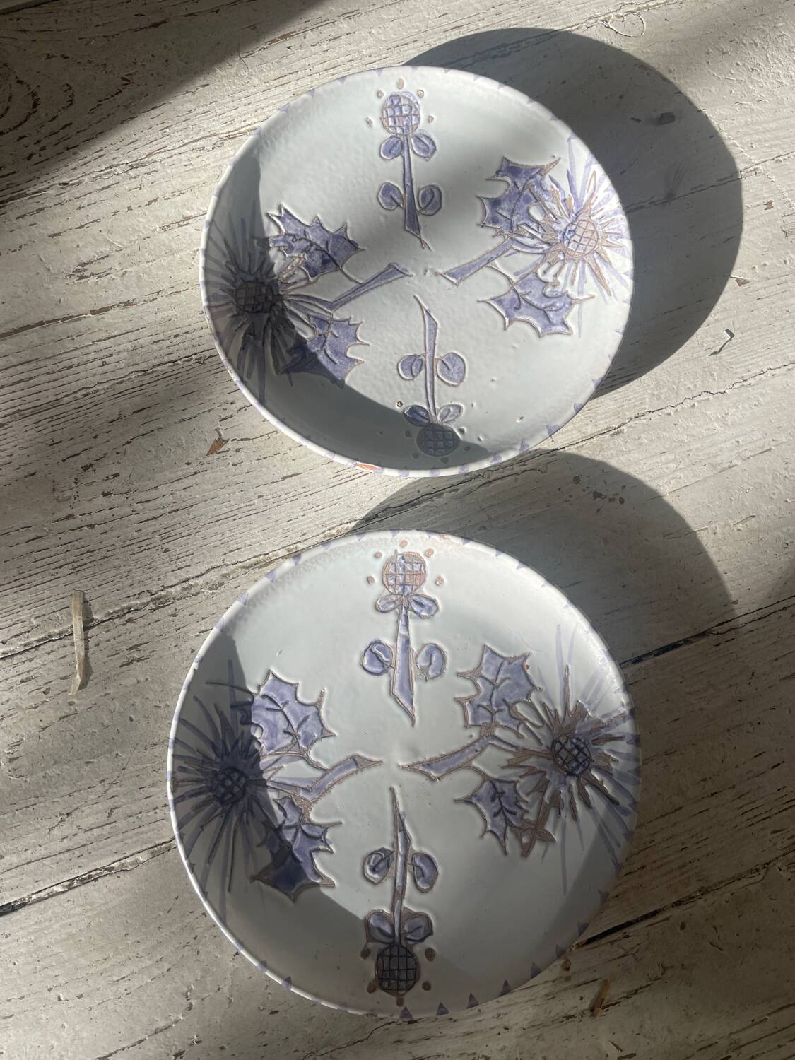 Pair of blue thistle plates