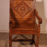 high-backed armchair from the 17th century in oak
