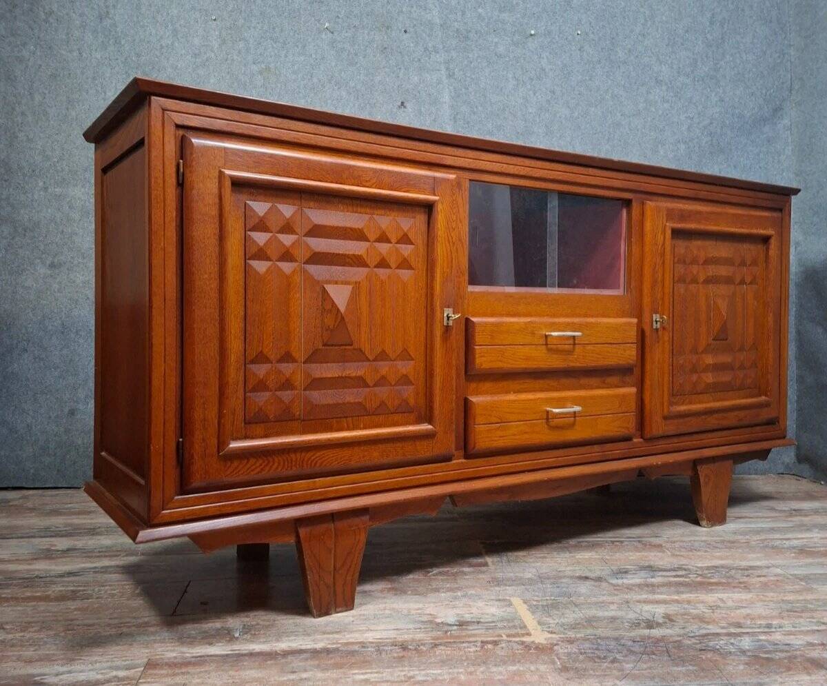 Low buffet in carved oak, Art Deco style, circa 1930.