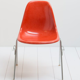 Chaise Eames produite par Herman Miller rouge