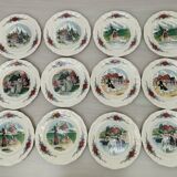 12 plates of the Obernai earthenware décor service signed Henri Loux