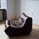 Togo armchair in dark brown shiny leather
