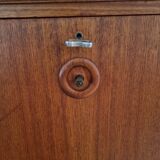 Small walnut and brass wall unit with desk function by William Watting