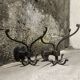 Brutalist pair of wall-mounted coat hooks.
