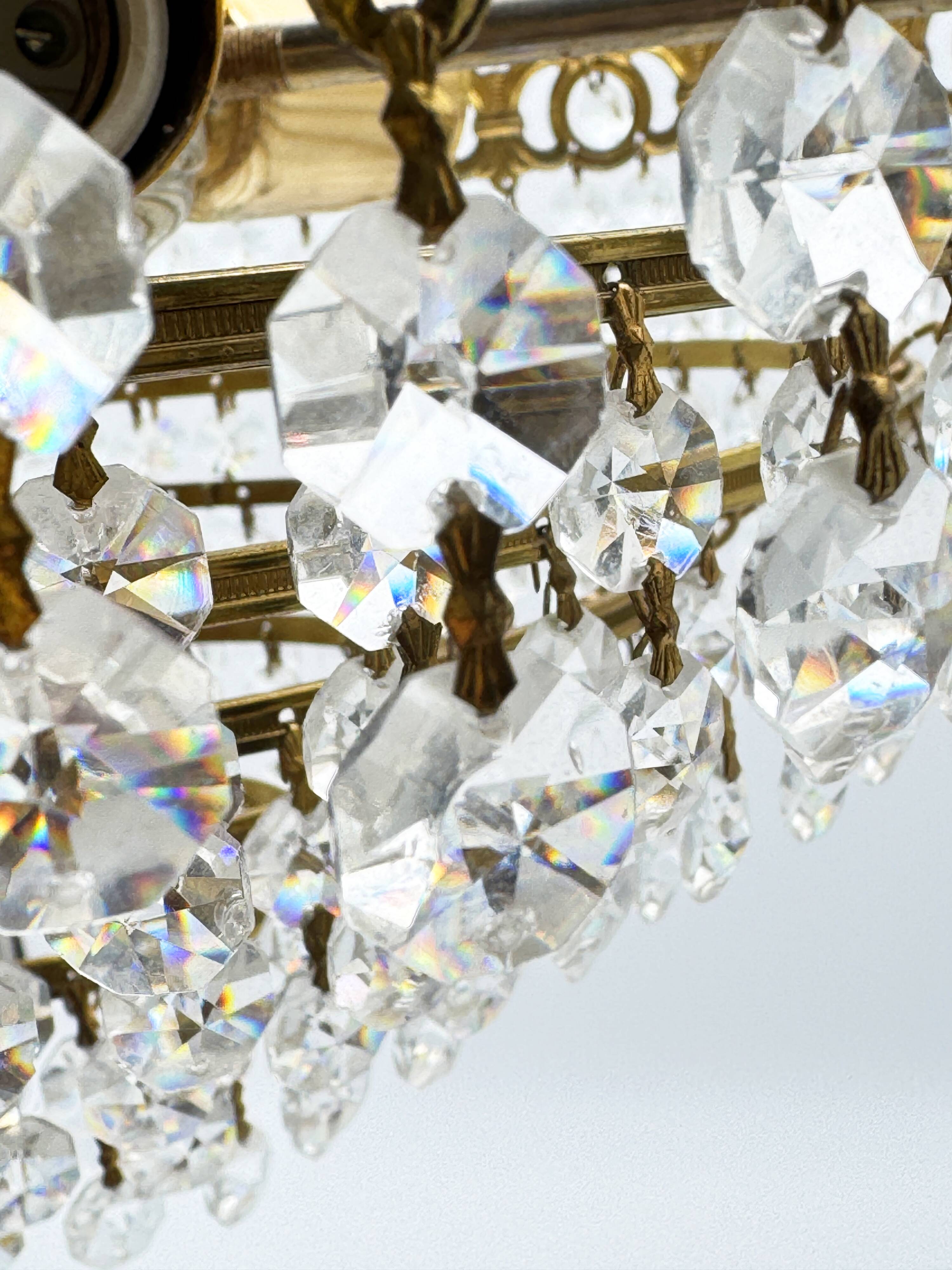 Brass and cut crystal basket chandelier, Empire style.