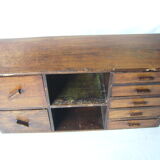 Antique, artisanal seven-drawer furniture