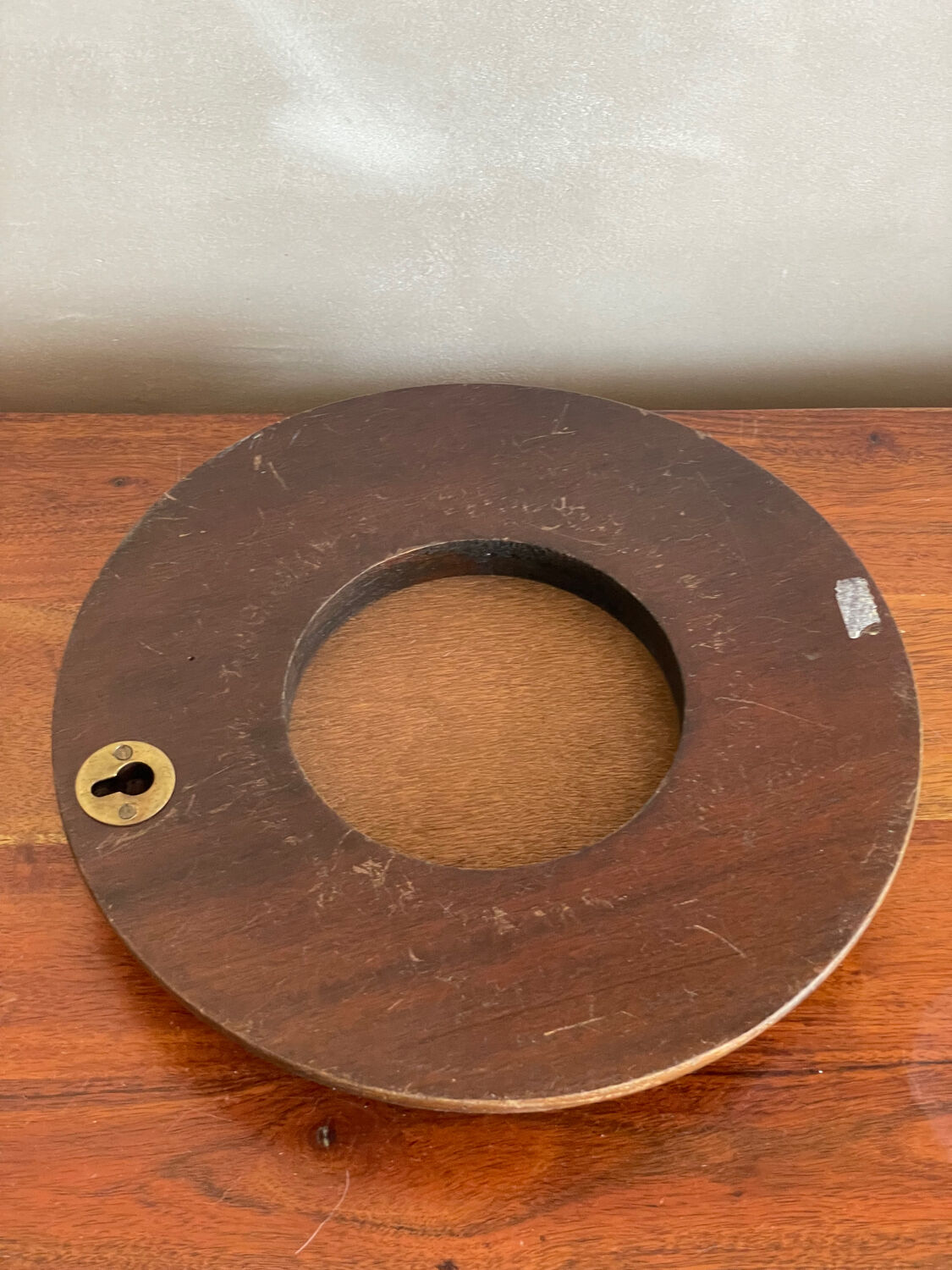 Wood and brass mirror