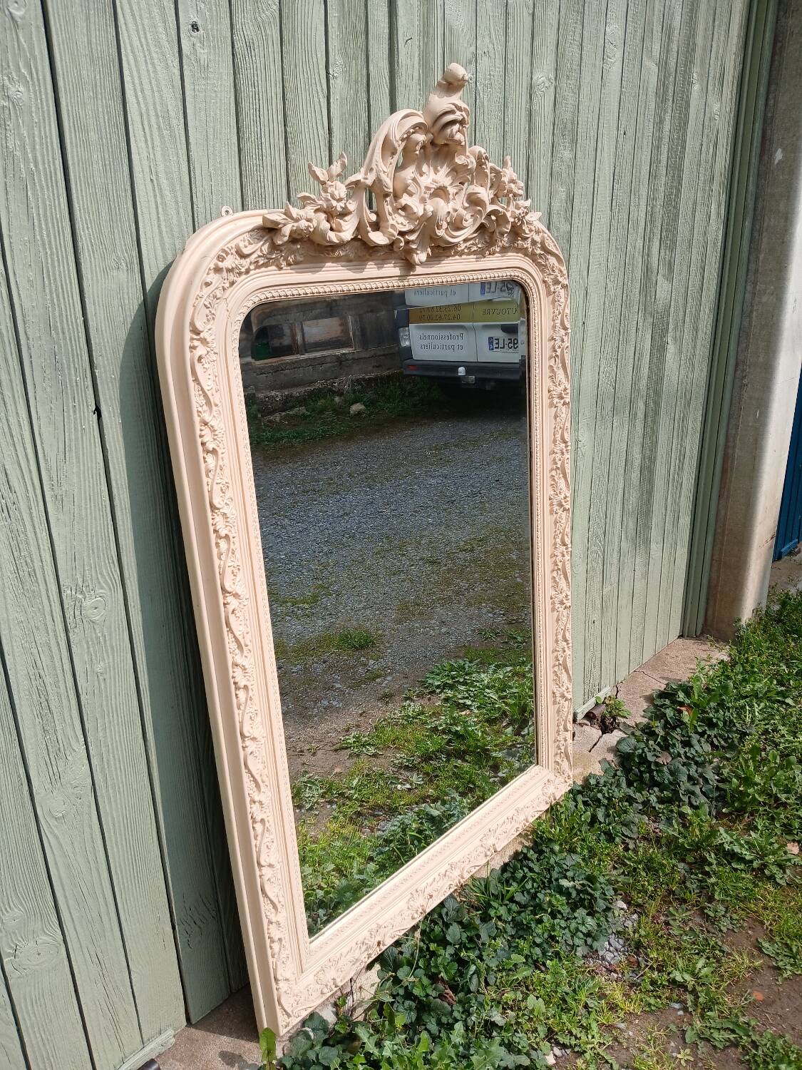 Antique carved wooden mirror