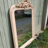 Miroir ancien en bois sculpté