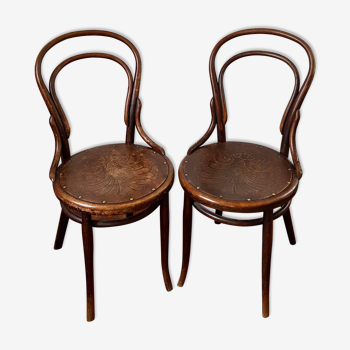 Curved wooden bistro chairs